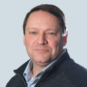 Mark Reagan' headshot.