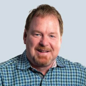 Tom Barron's headshot.