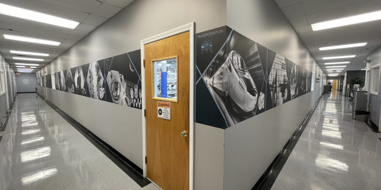 The hallway at Delta's U.S. headquarters with aerospace images.