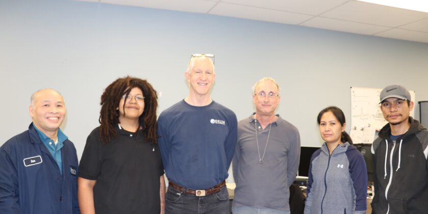 A photo of 6 Delta team members in the Beverly plant office.