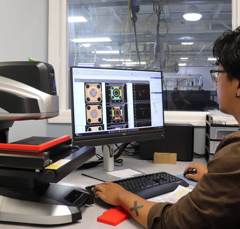 A Delta application engineer designing parts.