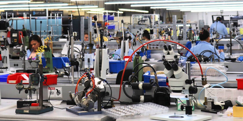 Team members at work at Delta's Beverly plant.