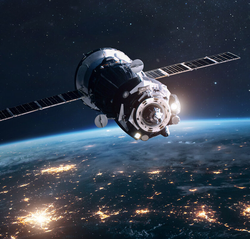 A space satellite hovering and surveying in space.