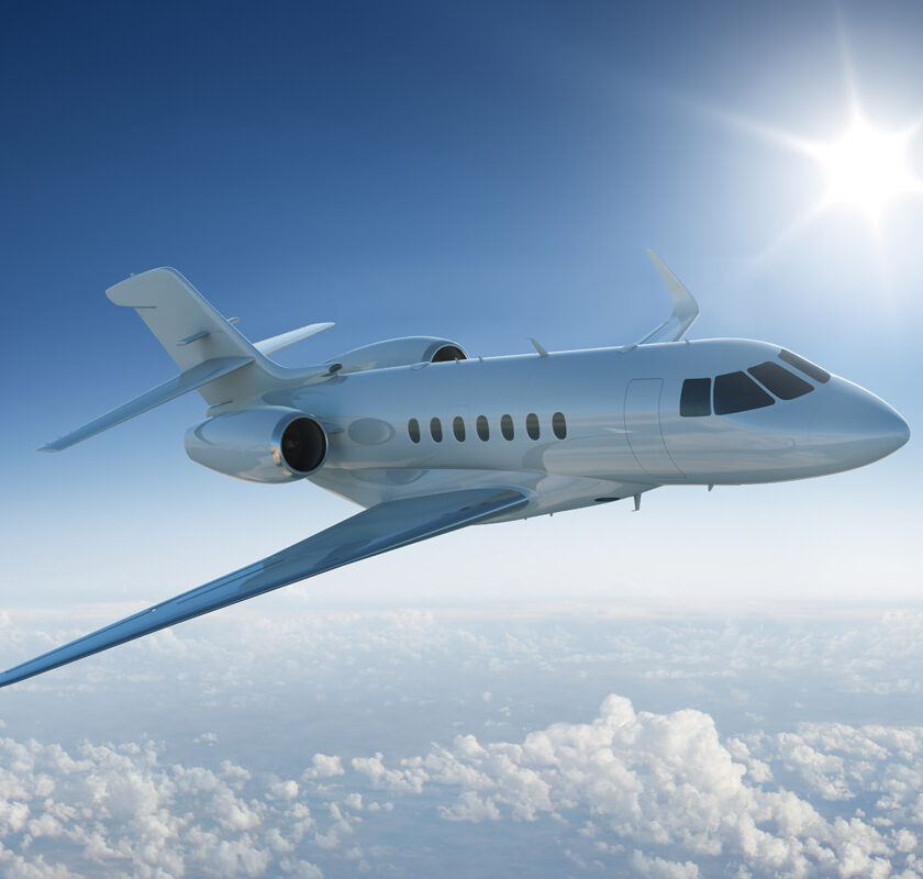 A commercial passenger aircraft flying over clouds.